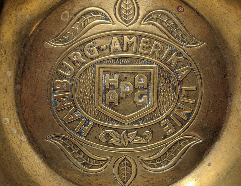 Various: pre-war - Impressive stamped brass HAPAG ashtray w/ Egyptian design