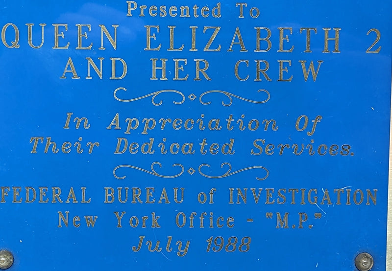 QE2: 1969 - FBI plaque presented to the QE2