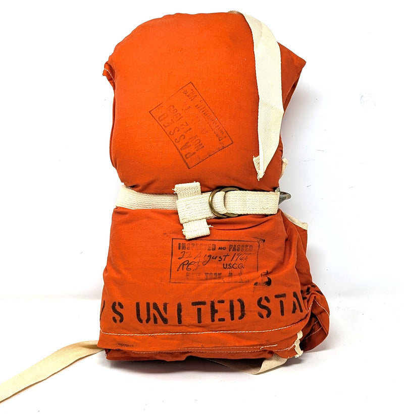 UNITED STATES: 1952 - Child's life preserver inspected 11/13/69
