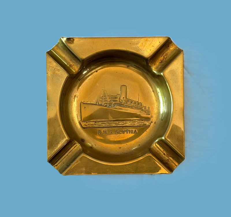 SCYTHIA: 1921 - Brass portrait ashtray